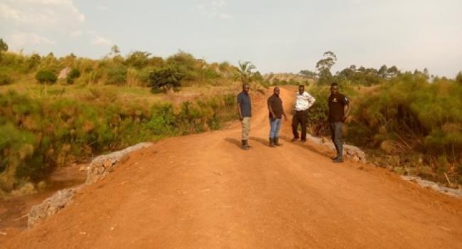 The Engineering Team together with Media checking on works done on Swamp Raising at Bwinamira III